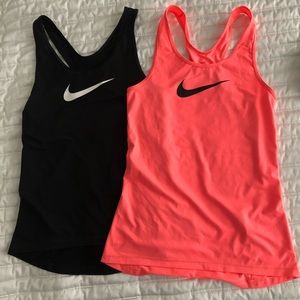2 Nike shirts